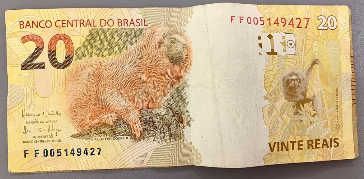 Cédula de vinte reais com imagem de mico-leão-dourado.